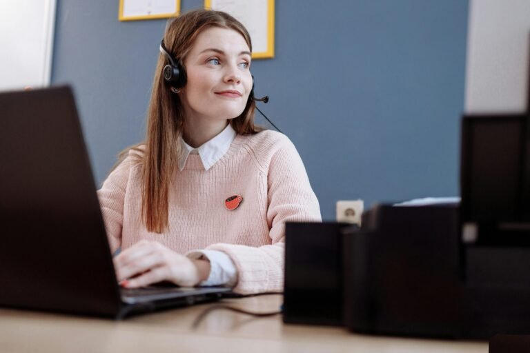 happy woman working on a computer during her job time